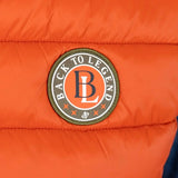 Doudoune sans manches orange BACK TO LEGEND (zoom badge)