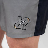Short de bain tricolore gris/noir/beige BACK to LEGEND (zoom sur le logo brodé)