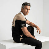 Polo scapulaire beige et noir Barbarians BACK to LEGEND (vue de 3/4 dos)