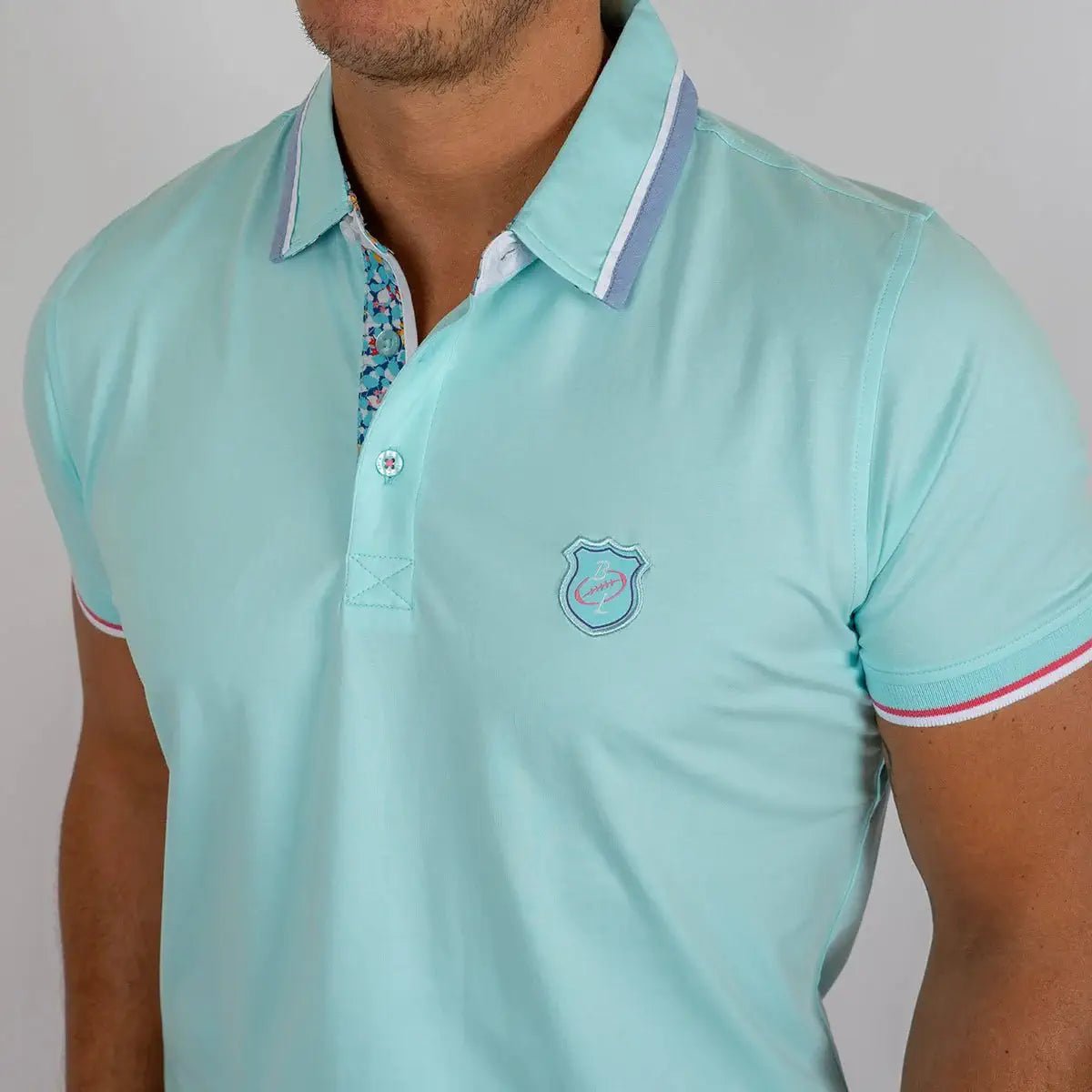 Polo homme turquoise en jersey élasthanne Blacks Legend (zoom poitrine)